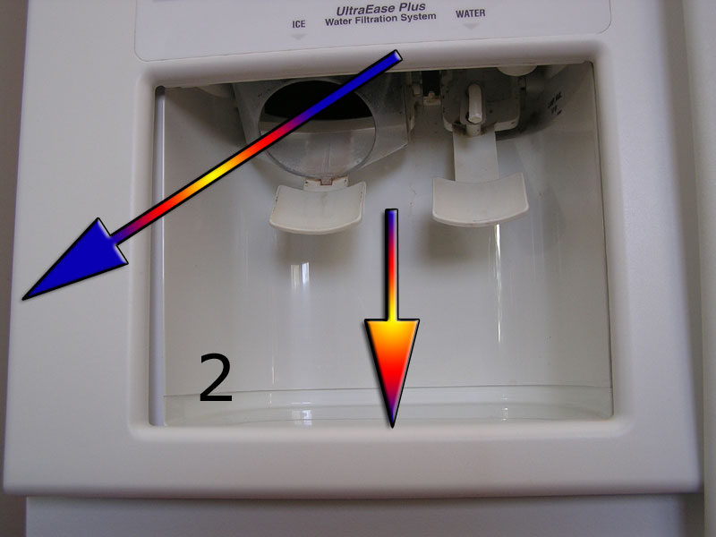 how to remove ice dispenser cover on a whirlpool refrigerator